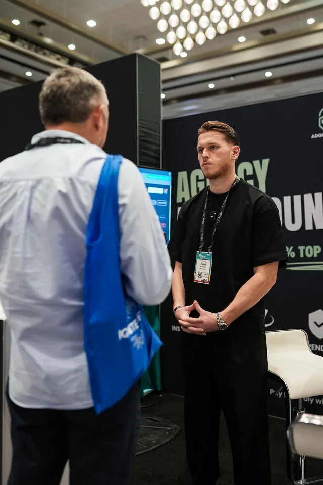 Talking with an advertiser at the AdGuardians booth
